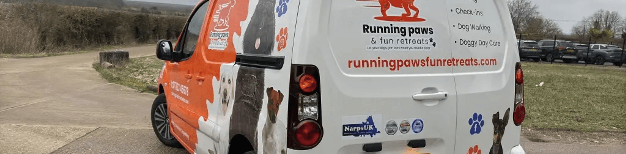 The rear of the Running Paws & Fun Retreats van